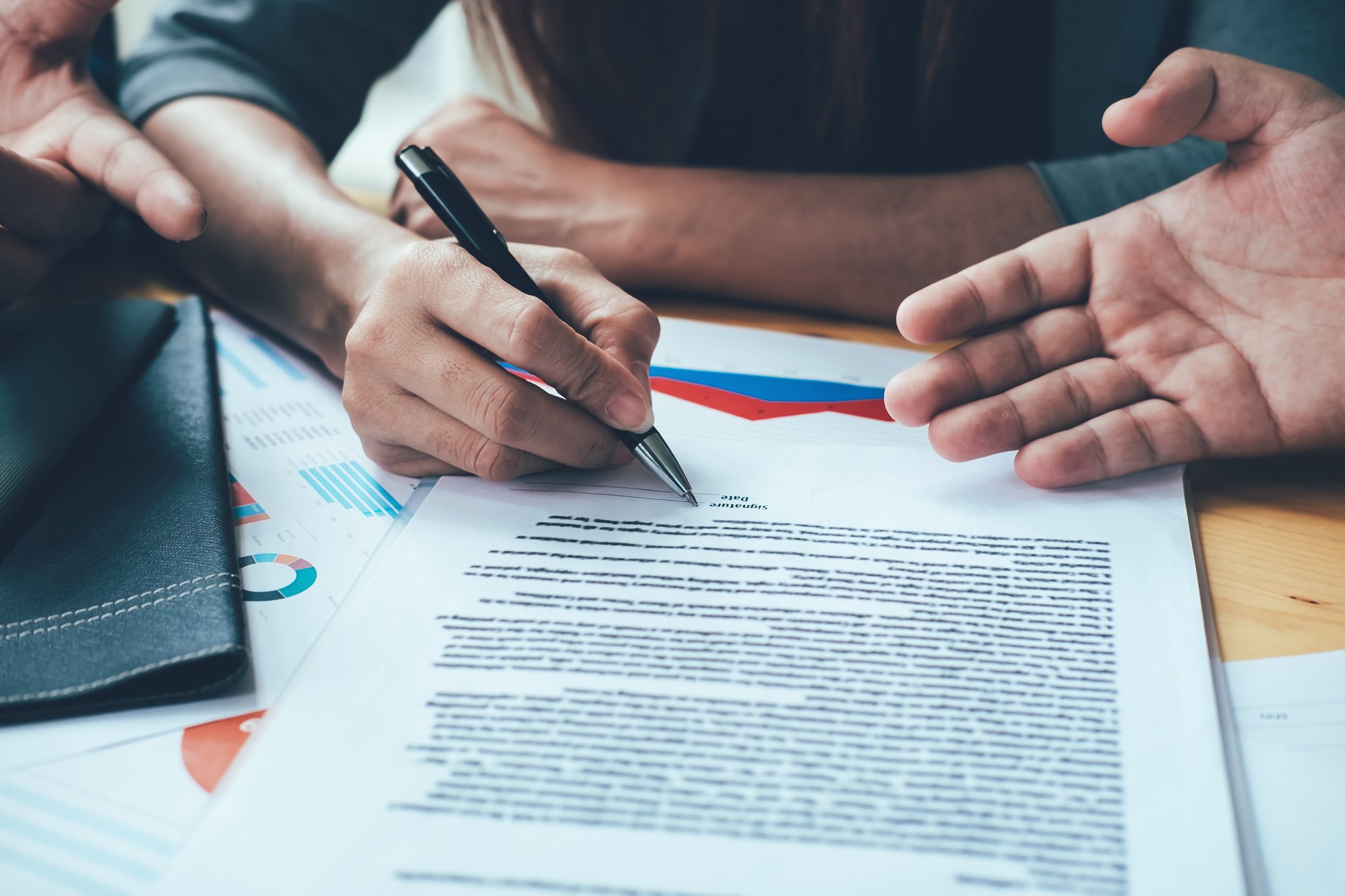 Client Signing a Business Contract